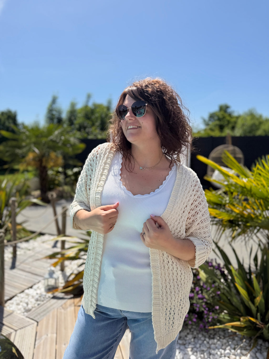 Le gilet en maille beige