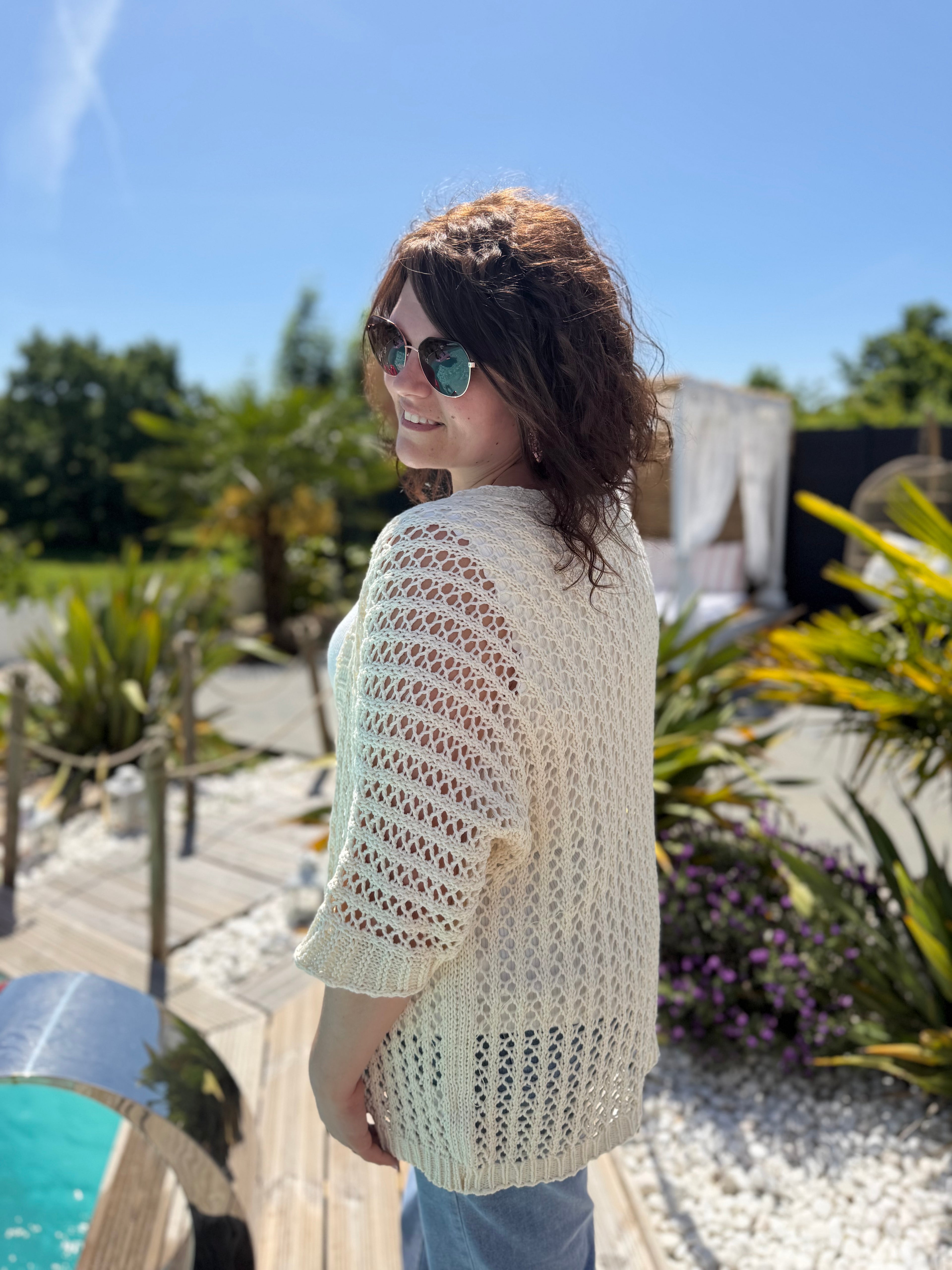 Le gilet en maille beige
