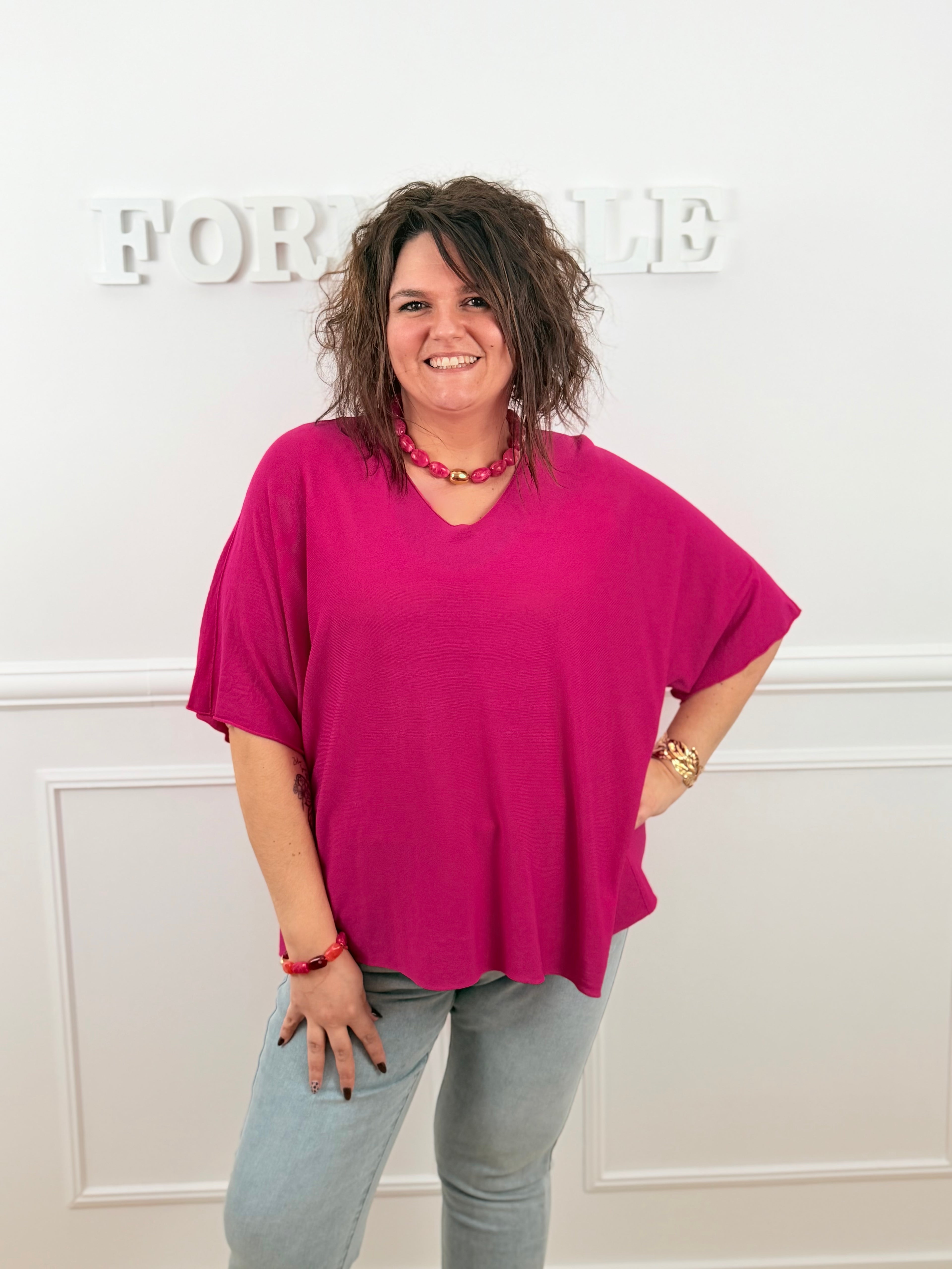 Le haut Camélia fushia